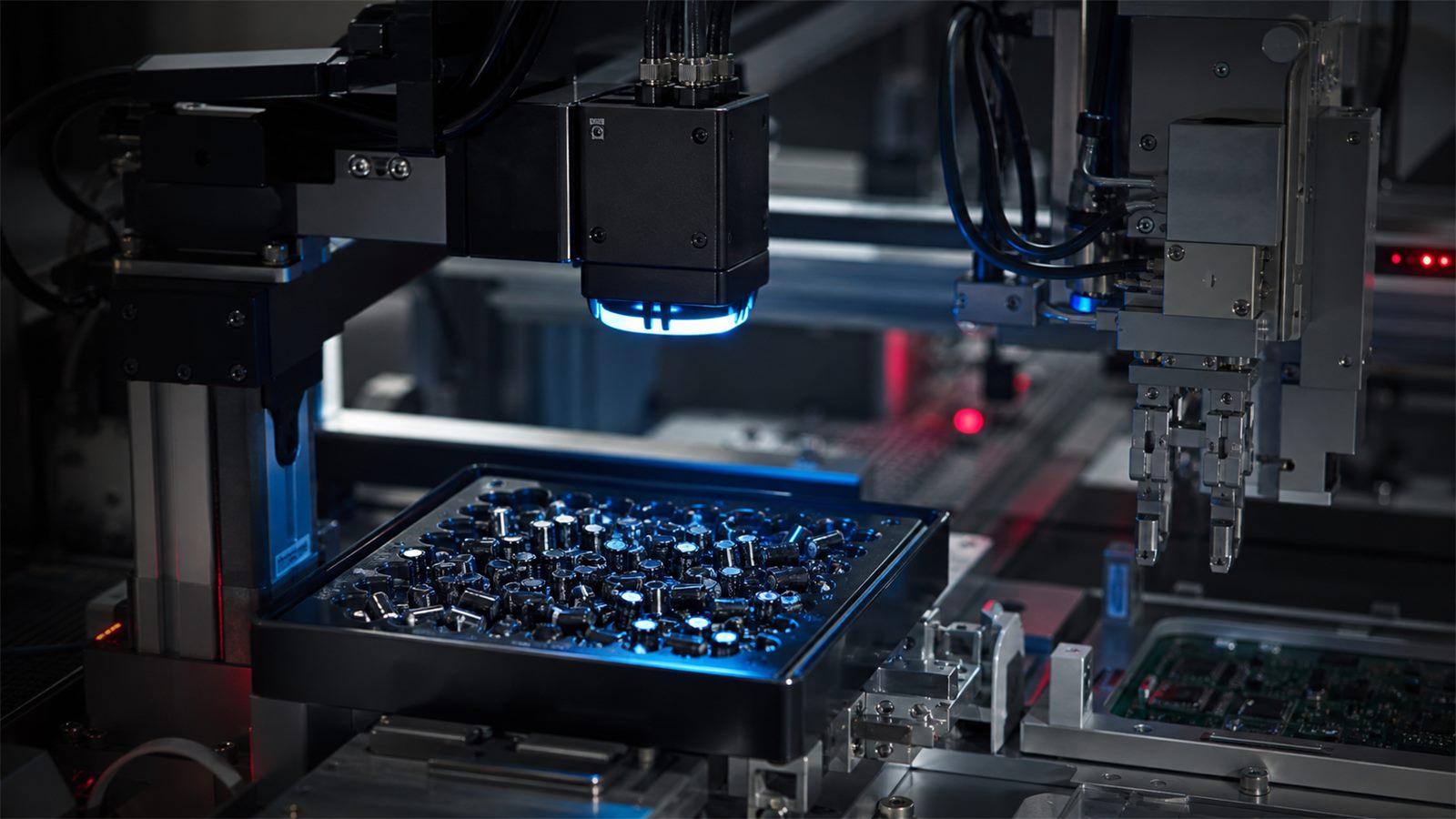 Robotic picking and positioning of dense capacitors